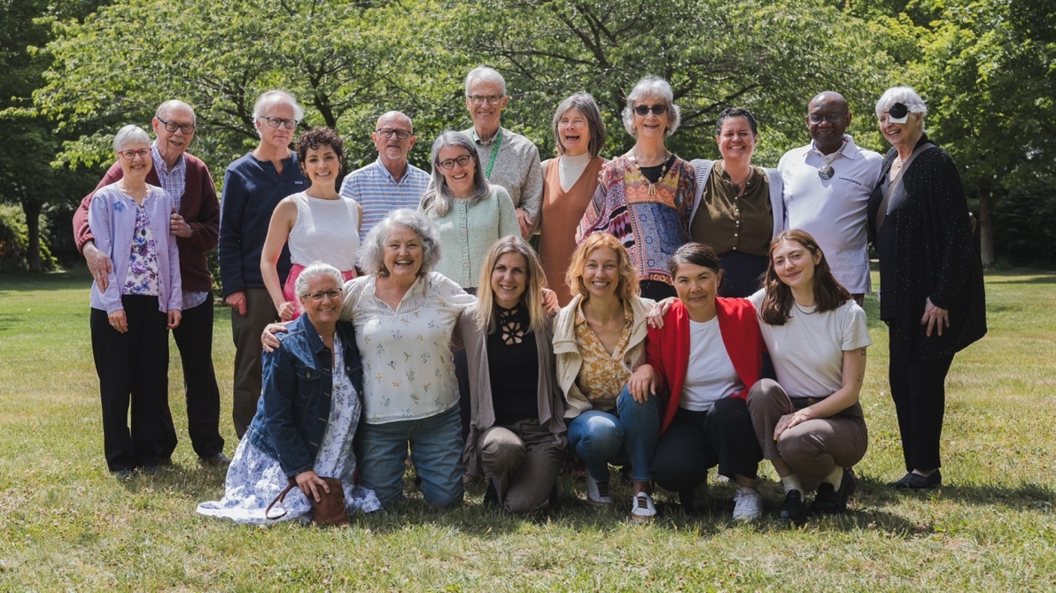 A group of people posing for a photo Description automatically generated