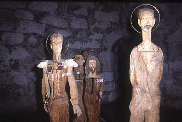 A group of wooden statues AI-generated content may be incorrect.