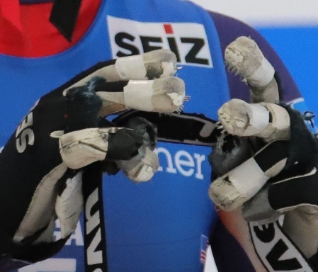 A person wearing a blue uniform Description automatically generated