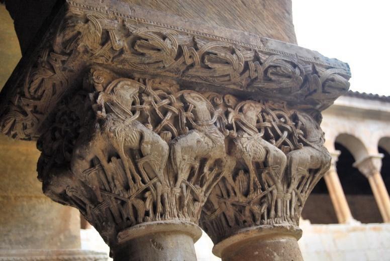 A stone pillar with carvings AI-generated content may be incorrect.