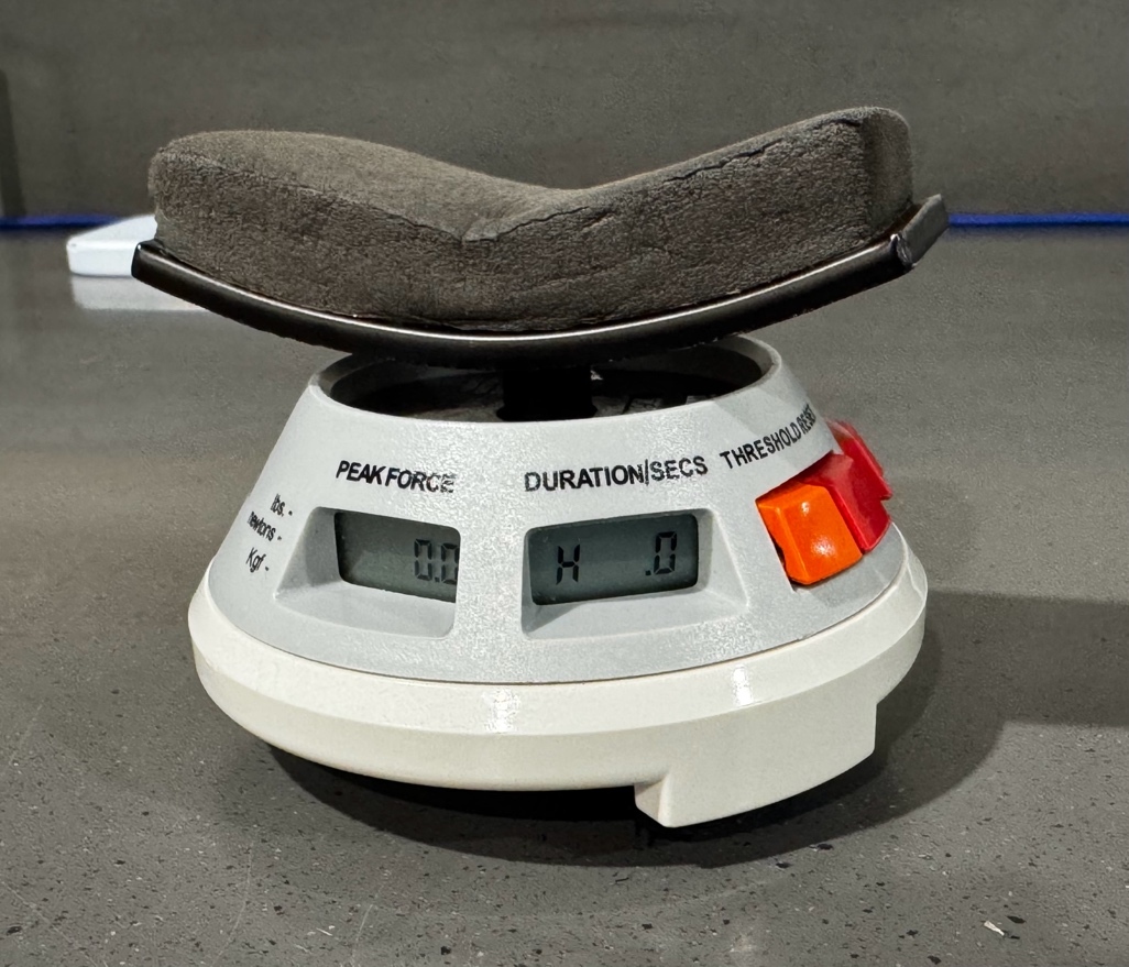 A black cushion on a white device AI-generated content may be incorrect.