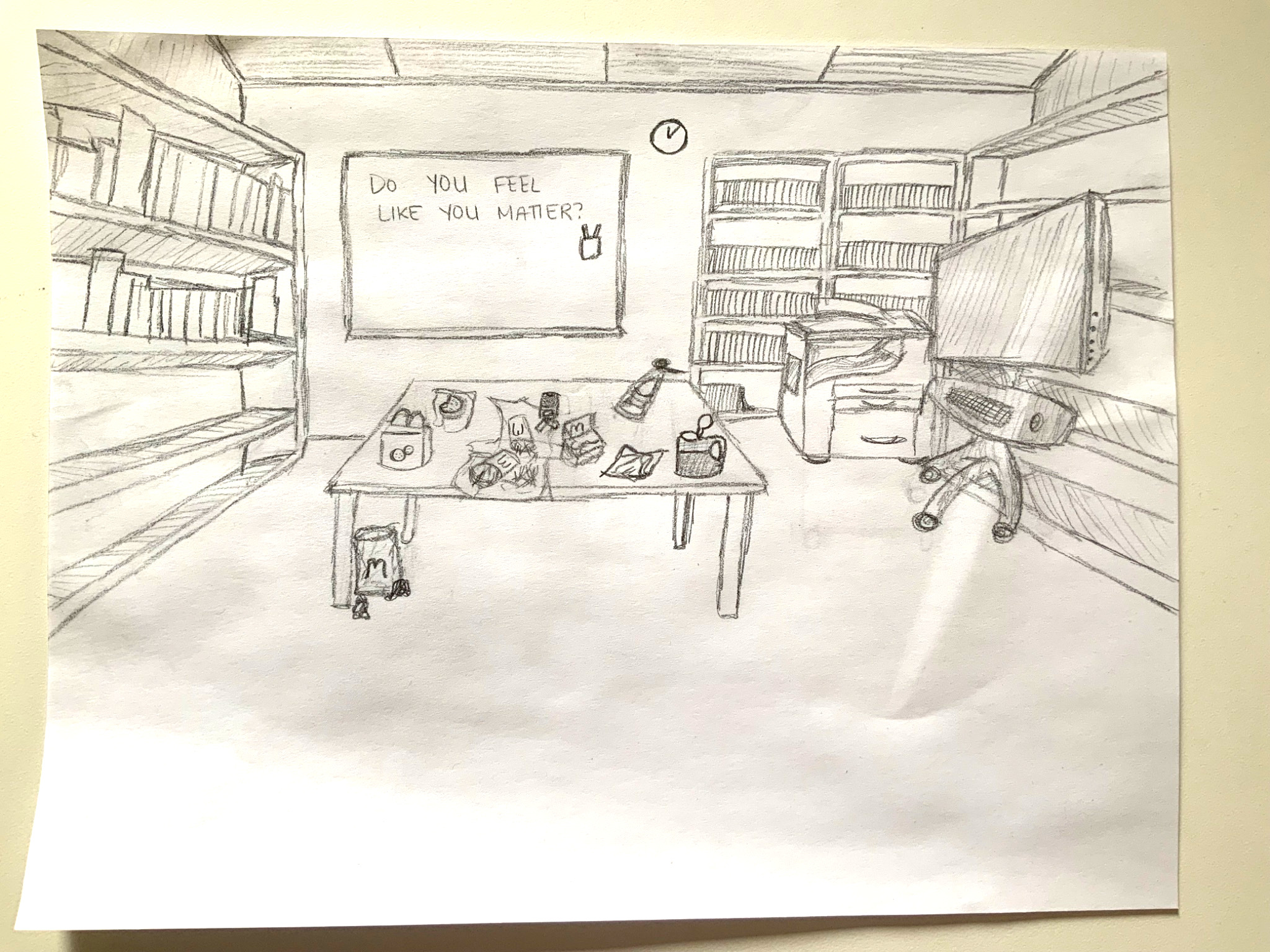 A pencil drawing of a small room into which a photocopier, a large screen, several shelves, and a small table have been crammed. Bags of food cover the table, waiting for people to eat them. On the whiteboard in the background, the words “Do you feel like you matter?” are faintly visible.