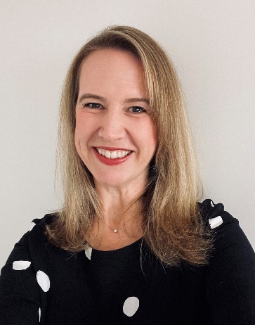 A person smiling for a picture AI-generated content may be incorrect.