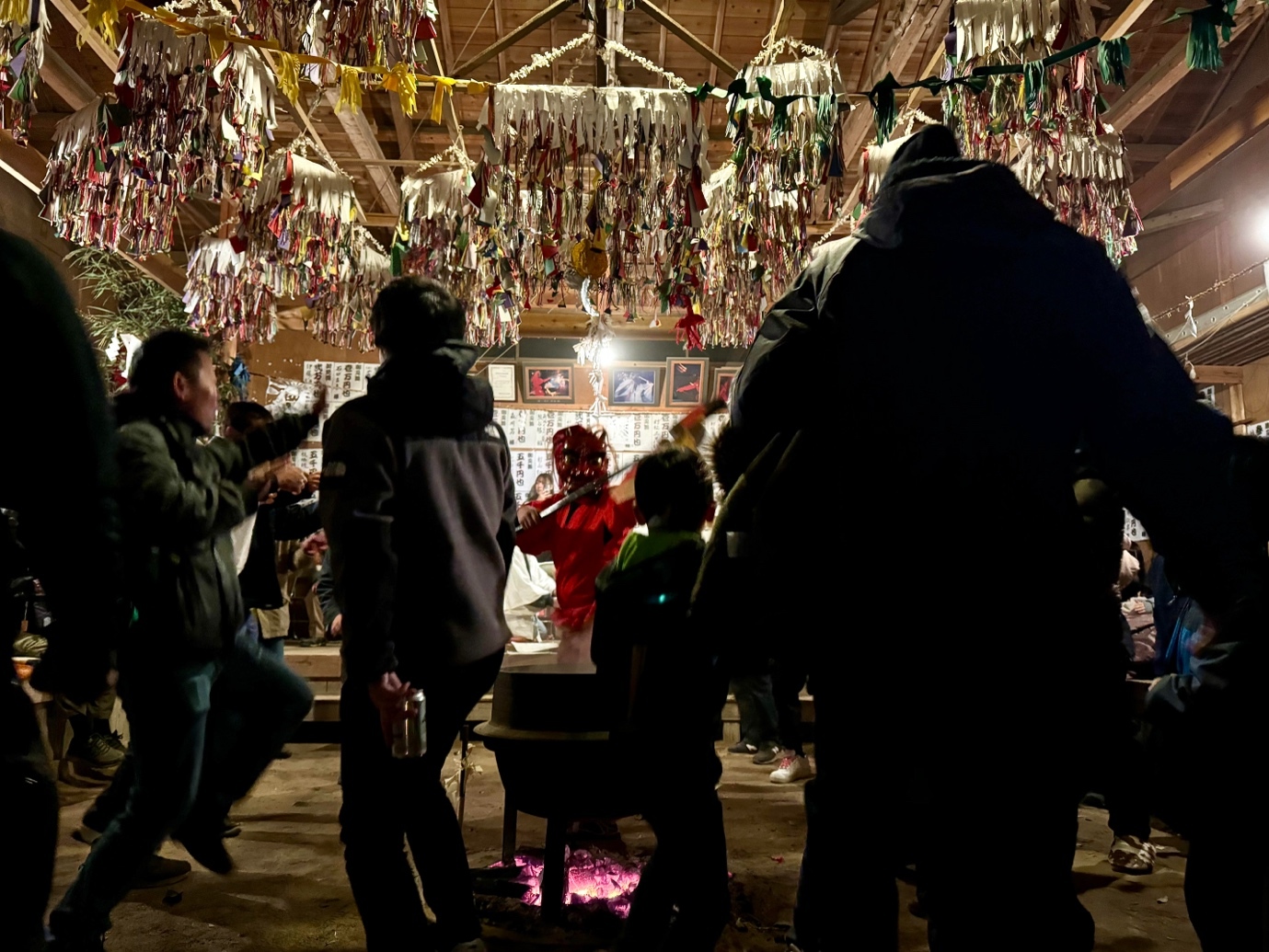 A group of people in a room with keys AI-generated content may be incorrect.