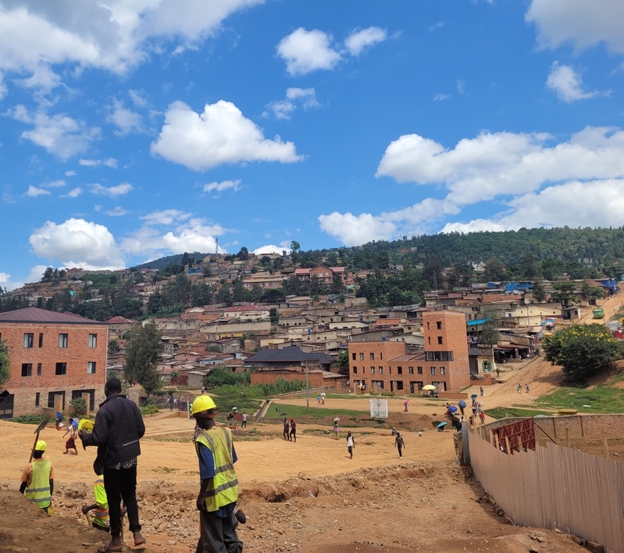 A group of people in a construction site AI-generated content may be incorrect.