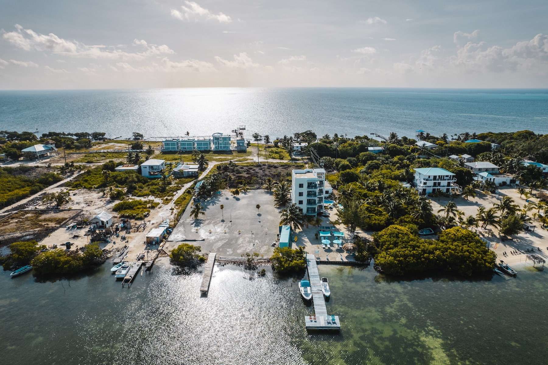 Turnkey Beachfront Modern Hotel with Private dock on North Side of Caye Caulker • Vista Real Estate