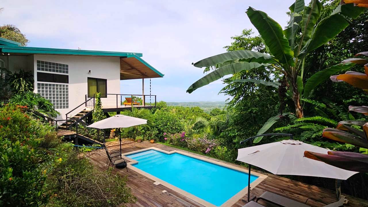 Turn Key Tropical Estate with 2 newly Built Homes and Spectacular Ocean Sunsets