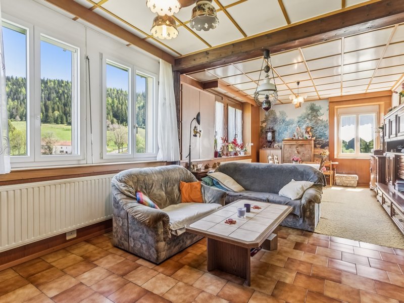 3.5-Zimmer Einfamilienhaus in Les Verrières - Wohnbereich