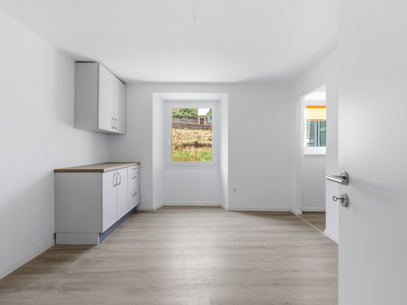 Immeuble collectif à Roveredo - Séjour et salle à manger
