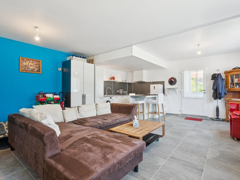 Immeuble collectif à Dompierre - Séjour et salle à manger