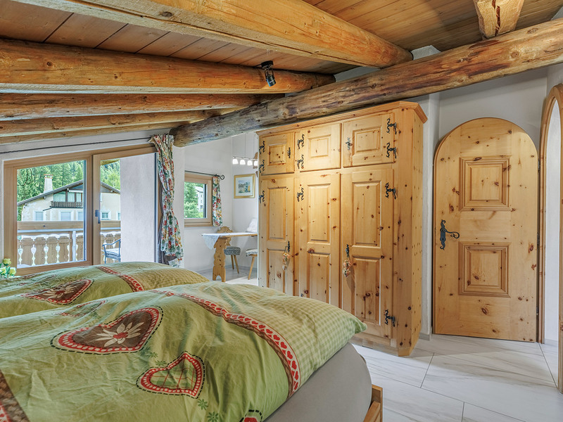 Appartement dans les combles de 2.5 pièces à La Punt - Chambre