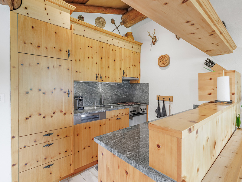 Appartement dans les combles de 2.5 pièces à La Punt - Cuisine