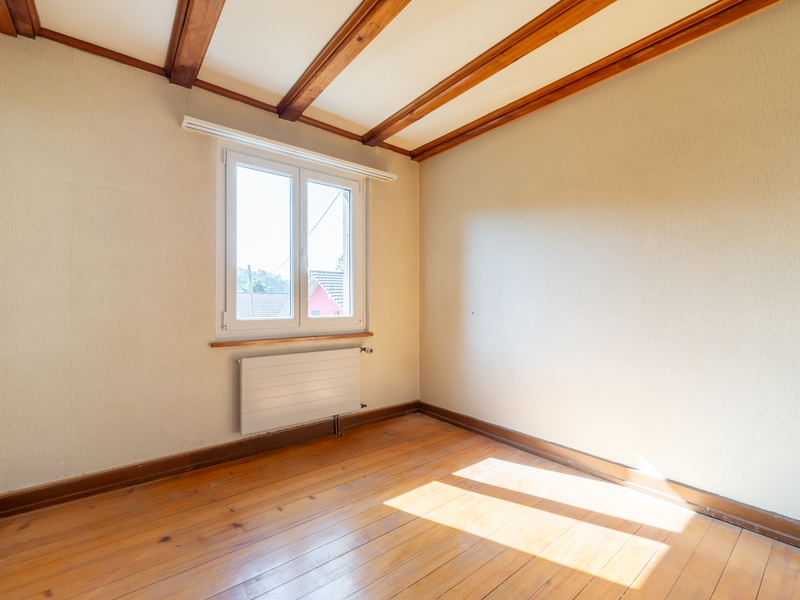 Maison d'angle mitoyenne de 8.5 pièces à Rüttenen - Chambre