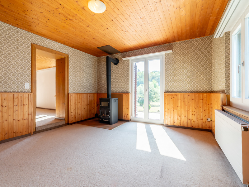 Maison d'angle mitoyenne de 8.5 pièces à Rüttenen - Séjour