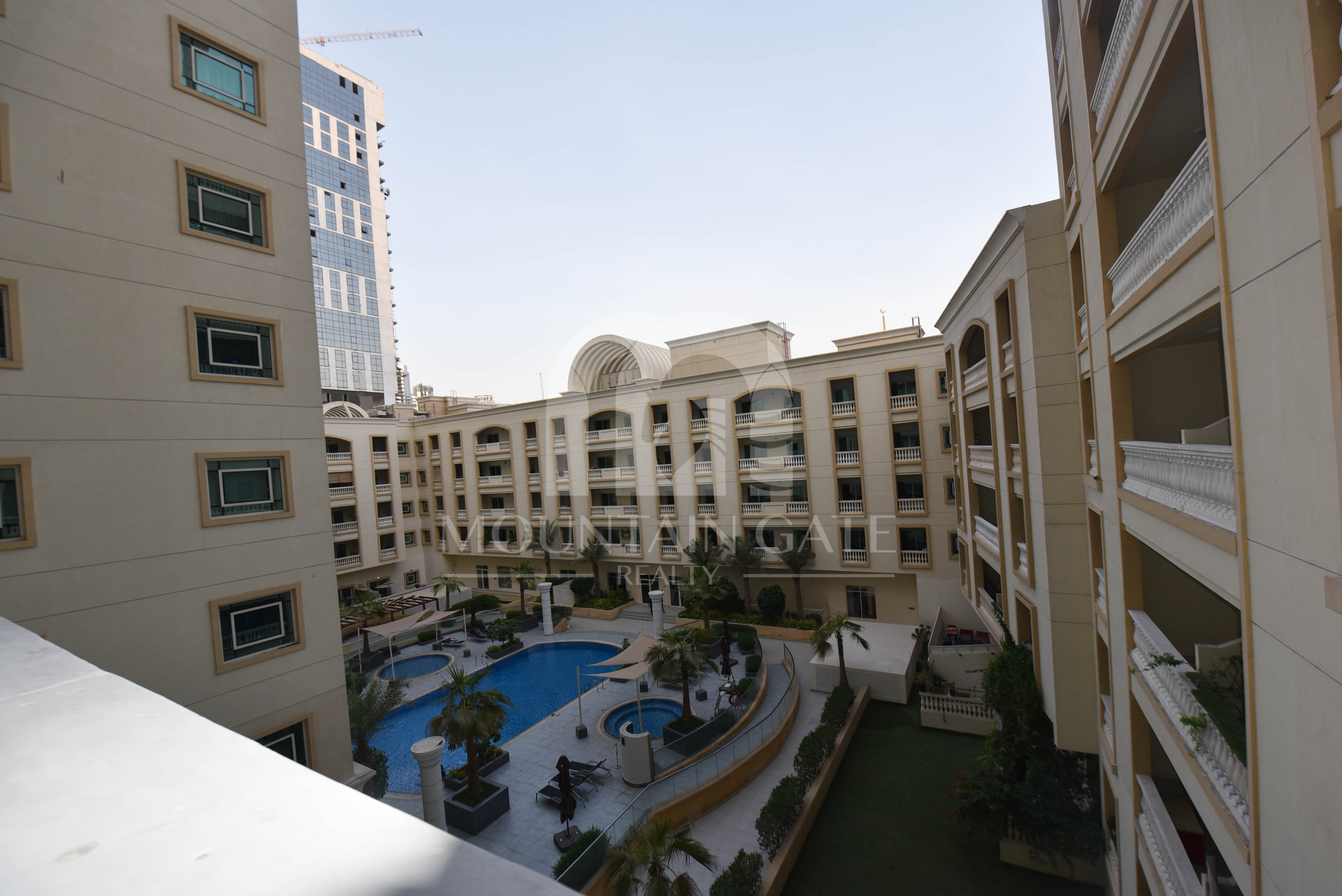 Huge Layout, Modern Kitchen & Pool View – VOT 2BR Jumeirah Village Circle Mountain Gate
