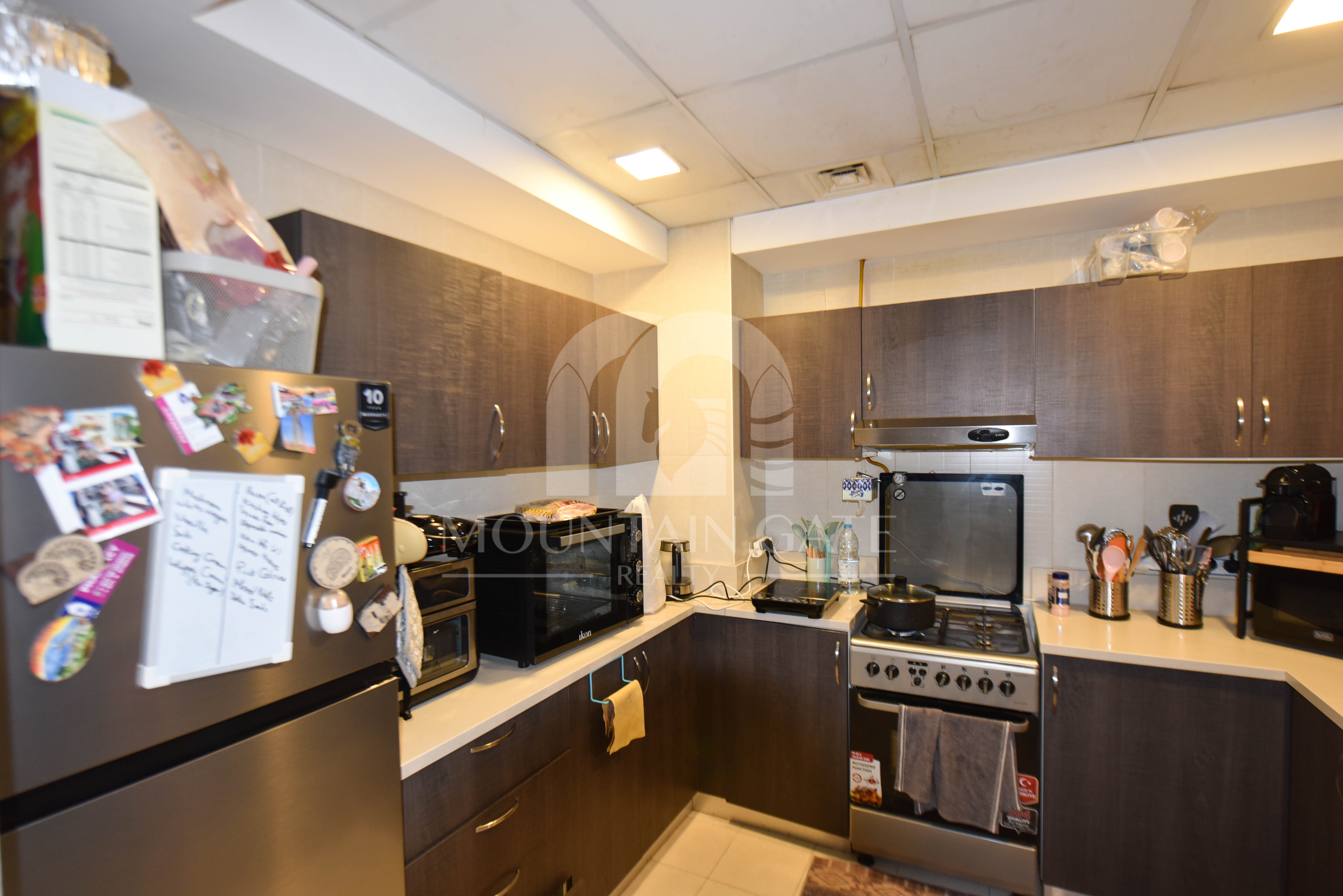 Huge Layout, Modern Kitchen & Pool View – VOT 2BR Jumeirah Village Circle Mountain Gate
