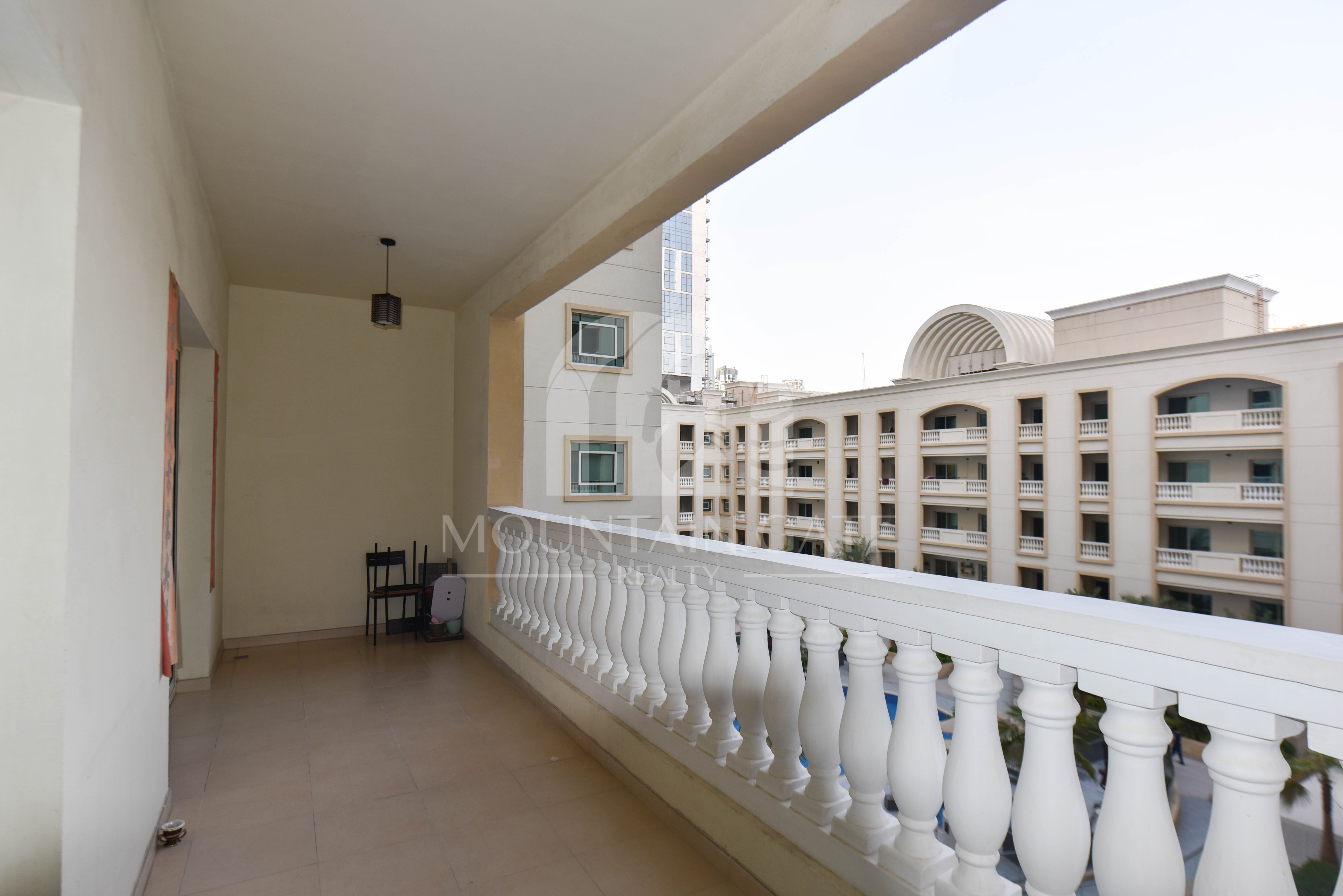 Huge Layout, Modern Kitchen & Pool View – VOT 2BR Jumeirah Village Circle Mountain Gate