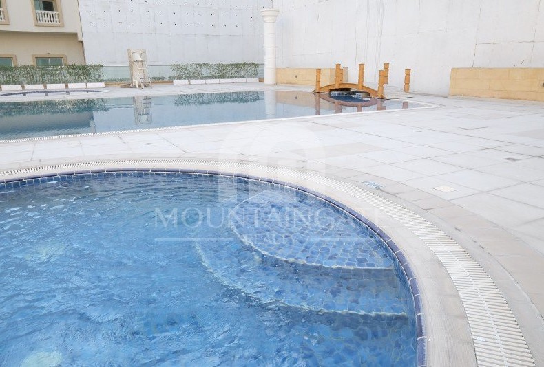 Huge Layout, Modern Kitchen & Pool View – VOT 2BR Jumeirah Village Circle Mountain Gate