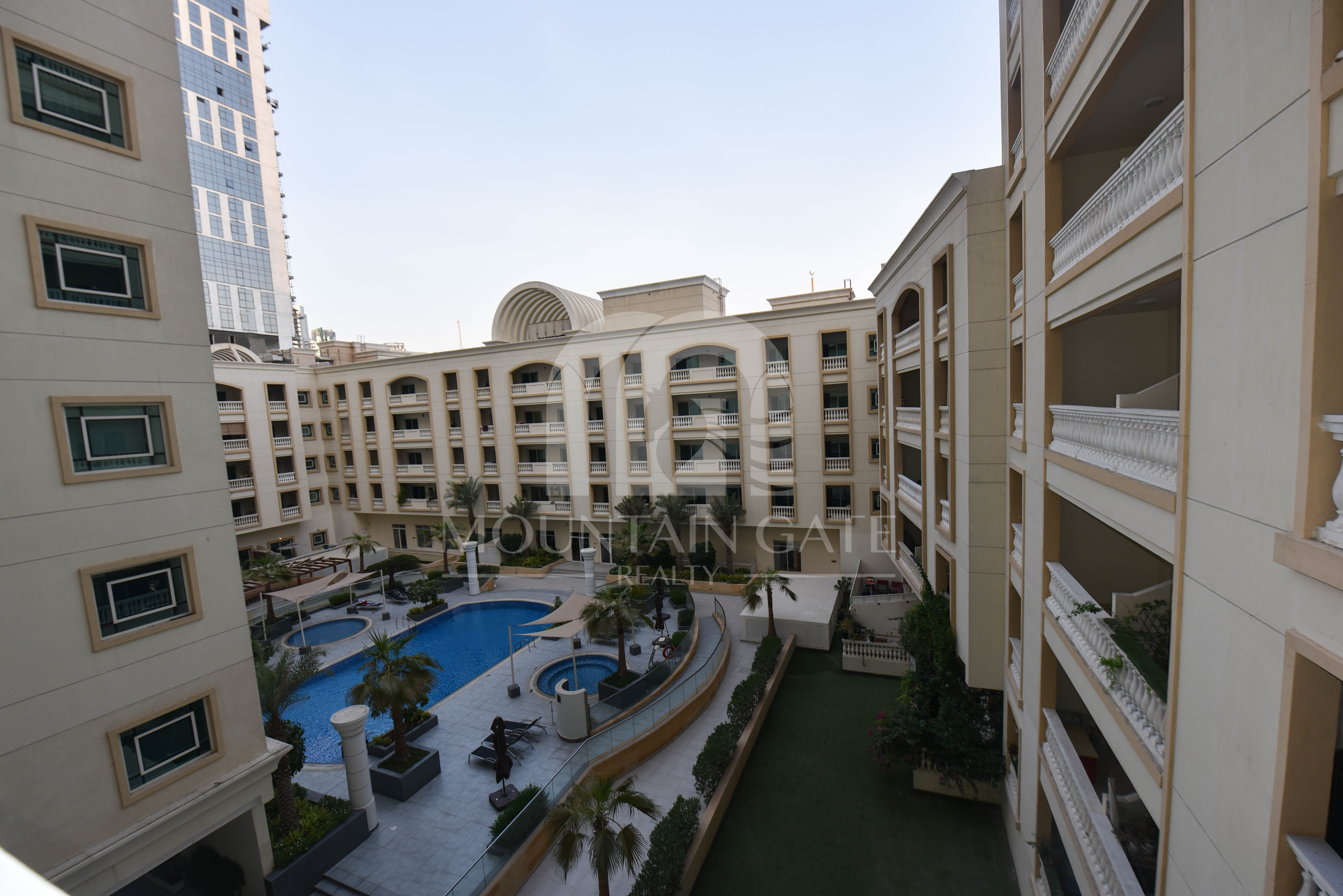 Huge Layout, Modern Kitchen & Pool View – VOT 2BR Jumeirah Village Circle Mountain Gate