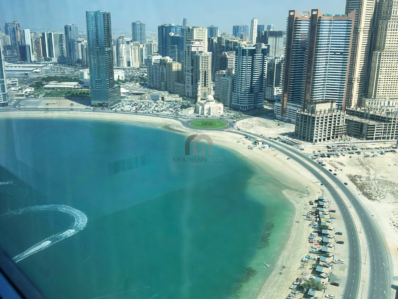 Wake Up to Panoramic Sea Views at La Plage Tower 2BR Al Mamzar - Sharjah Mountain Gate