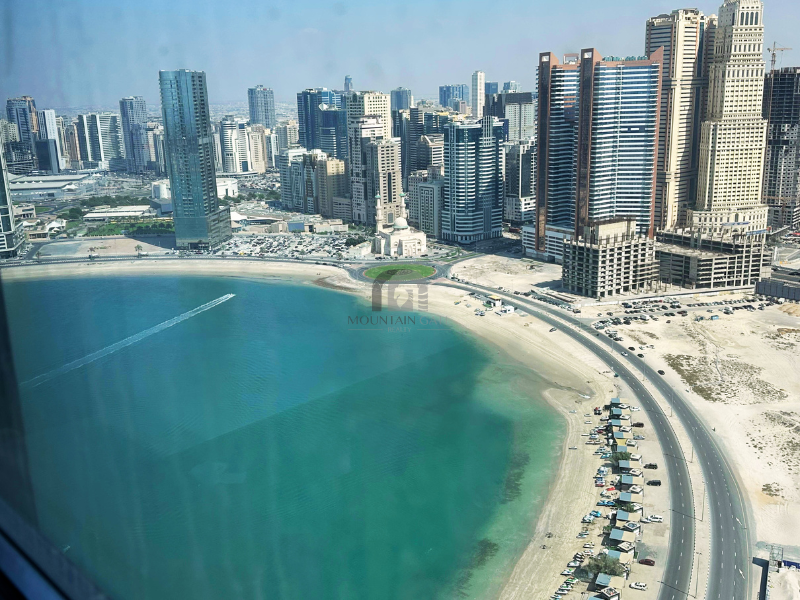 Wake Up to Panoramic Sea Views at La Plage Tower 2BR Al Mamzar - Sharjah Mountain Gate