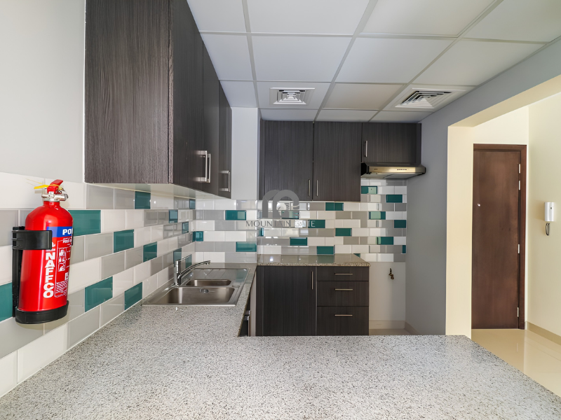 Spacious | Garden and pool view | Closed kitchen 1BR Muwaileh Commercial Mountain Gate