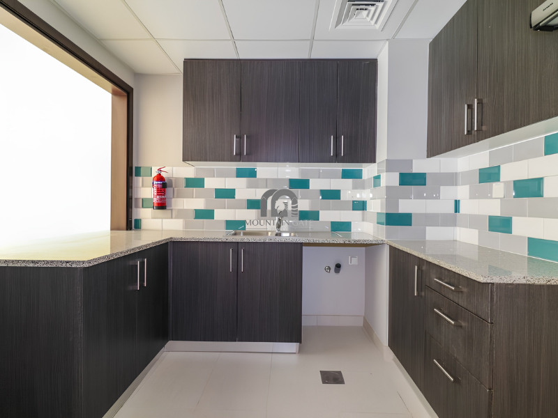 Spacious | Garden and pool view | Closed kitchen 1BR Muwaileh Commercial Mountain Gate