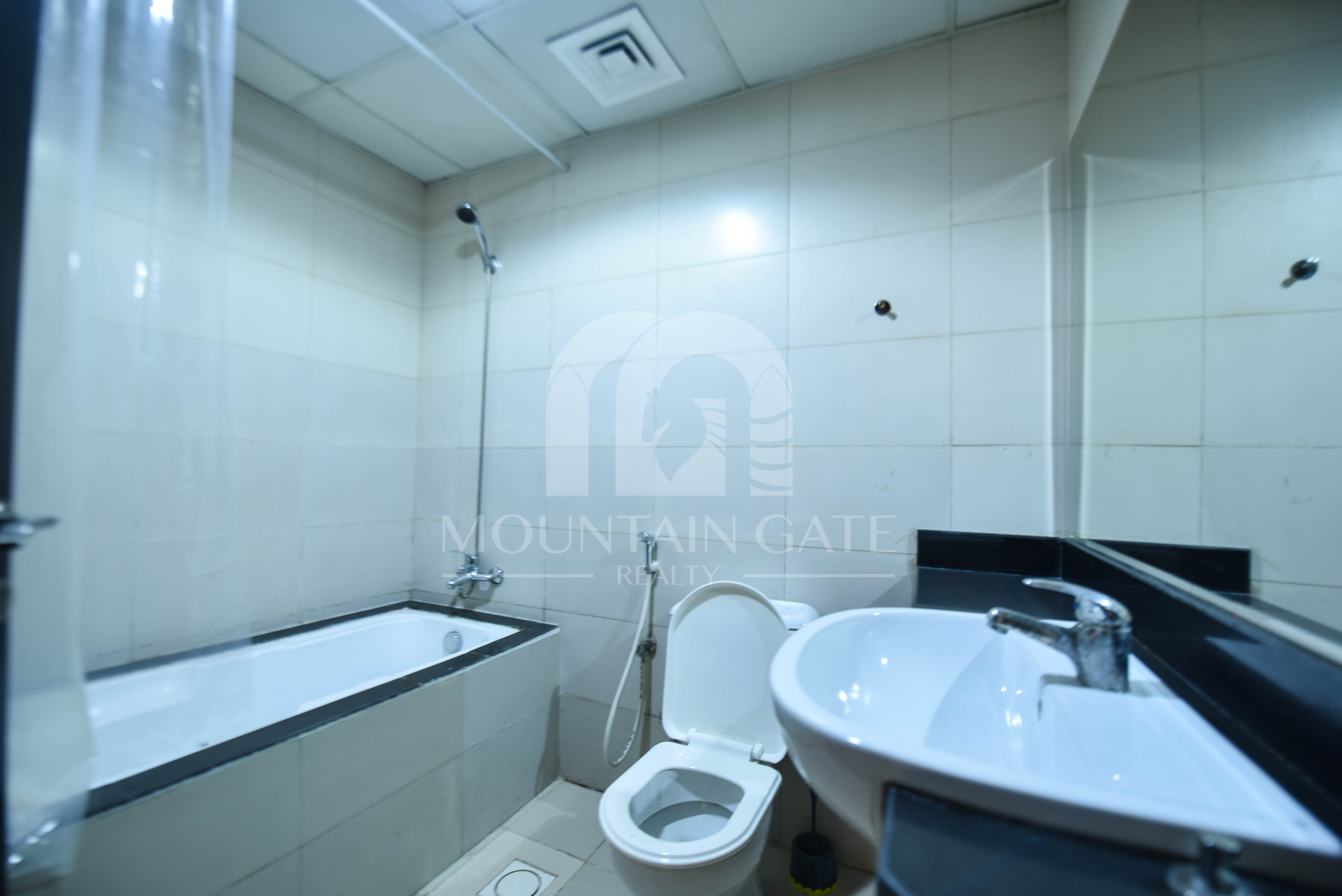 Stunning Pool View | Spacious & Move-In Ready 1BR Jumeirah Village Circle Mountain Gate