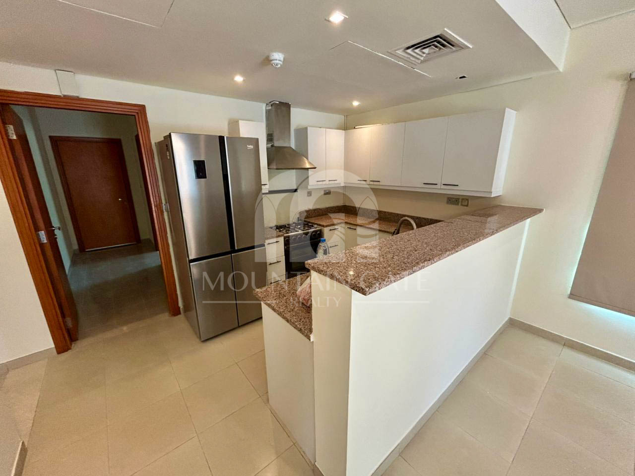 Ready to Move in Large Plot Prime Location 2BR Jumeirah Village Circle Mountain Gate