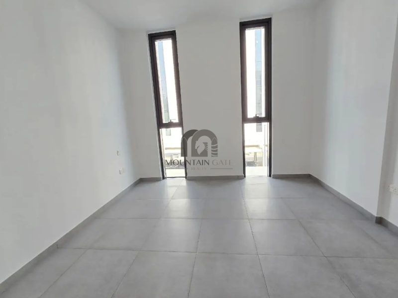 Studio East Village | Pool view | Rented 34 k Aljada Mountain Gate