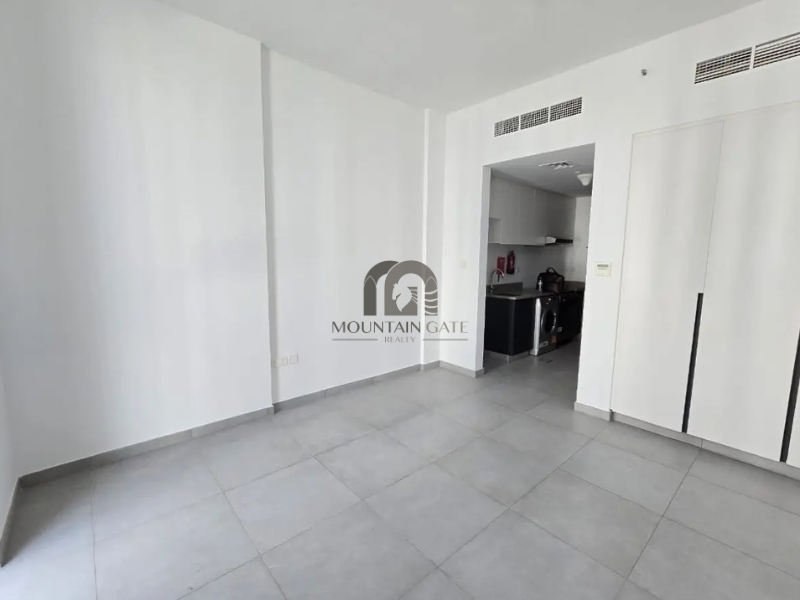 Studio East Village | Pool view | Rented 34 k Aljada Mountain Gate