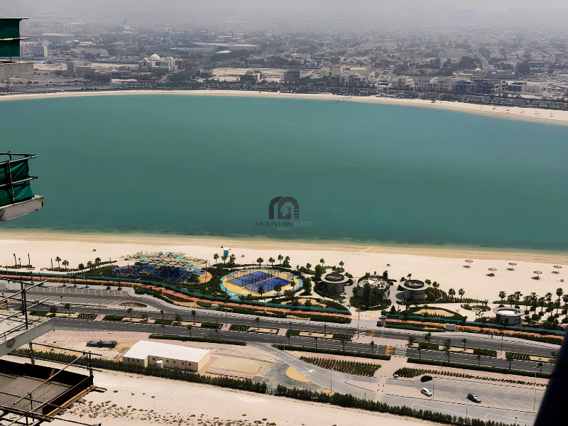 Large space | Laundry room | Side sea view 1BR Al Mamzar - Sharjah Mountain Gate