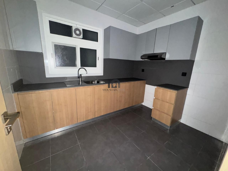 Large space | Laundry room | Side sea view 1BR Al Mamzar - Sharjah Mountain Gate