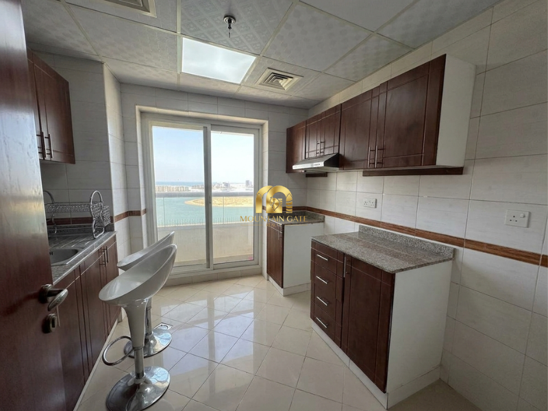 sea view | Family tower | Great price | Vacant 2BR الخان Mountain Gate