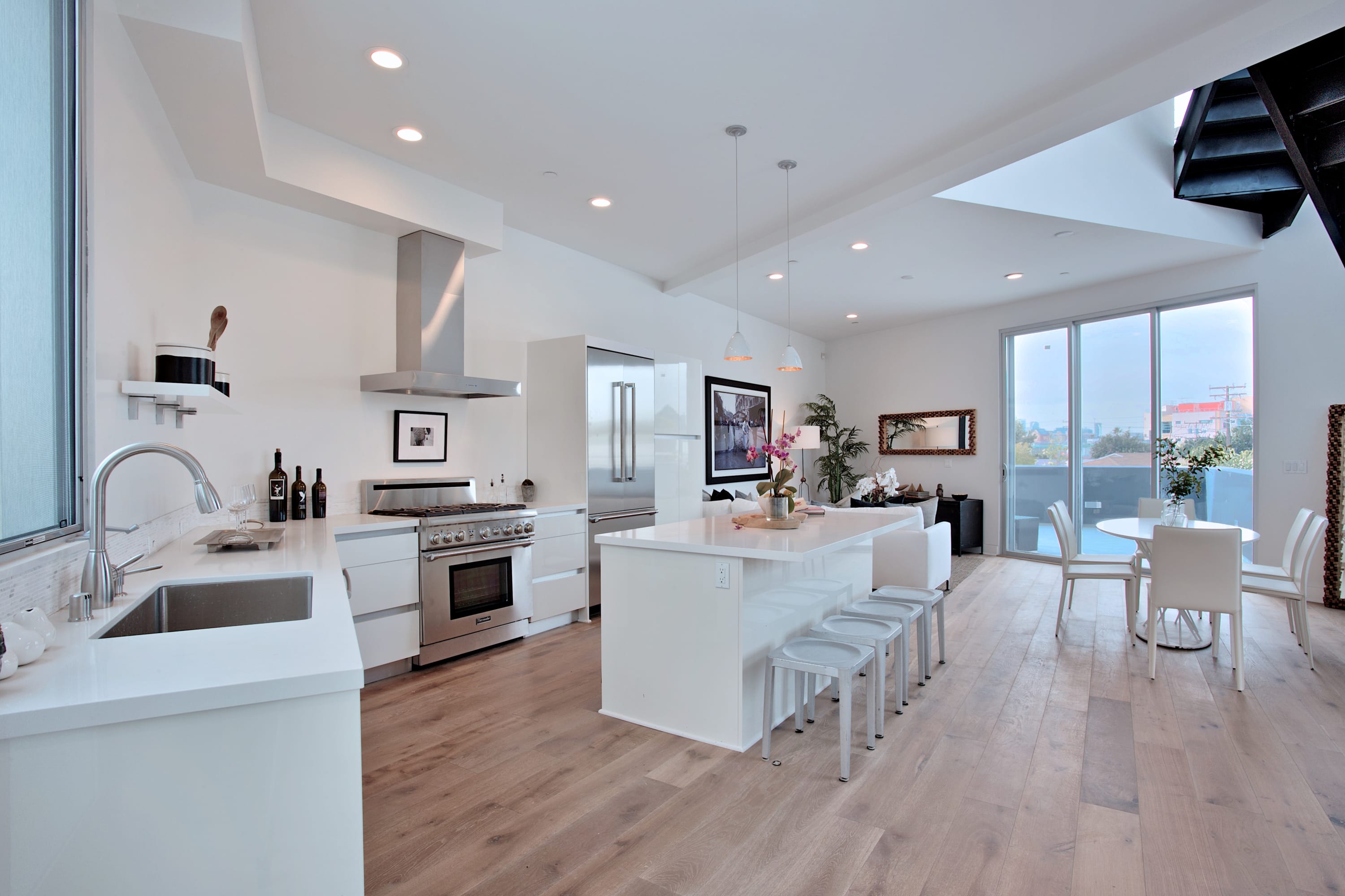 white kitchen in a luxury loft condo in los angeles 616 N Croft Ave #PH8