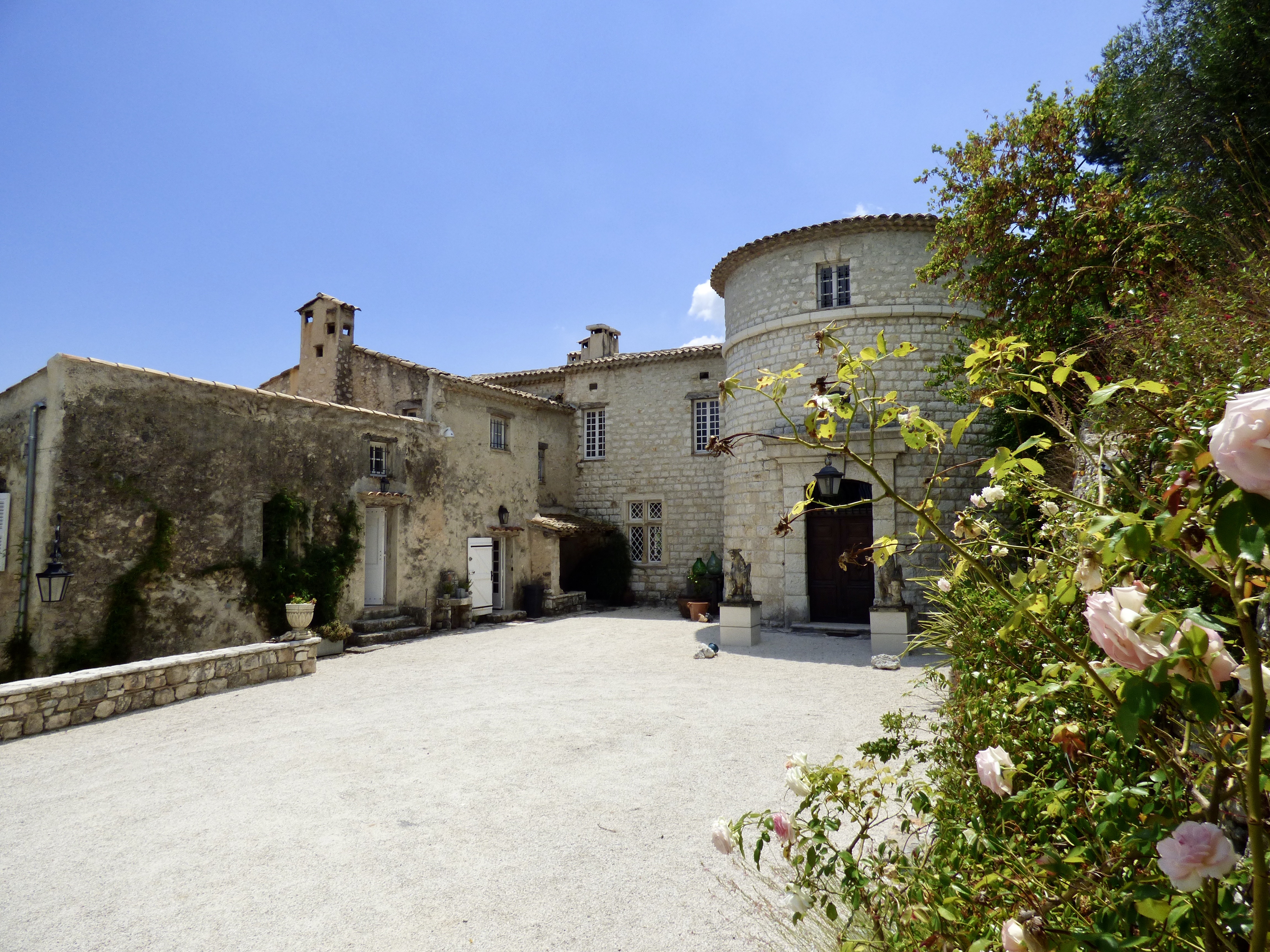 restored french chateau overlooking medieval villages