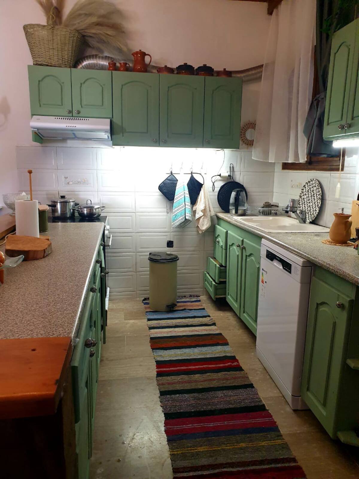 Listing photograph 12 of 13 of the house in Lefkimmi, published by Roula Rouva Real Estate.