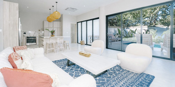 Elevated Tropical Living: Panoramic Skyline Views & Steps to the Surf