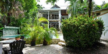 7-Unit Boutique Hotel with Pool and Commercial Growth Potential