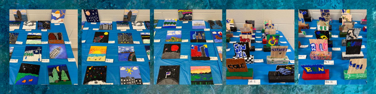 A display of student artwork featuring colorful paintings and 3D sculptures on blue tablecloths.