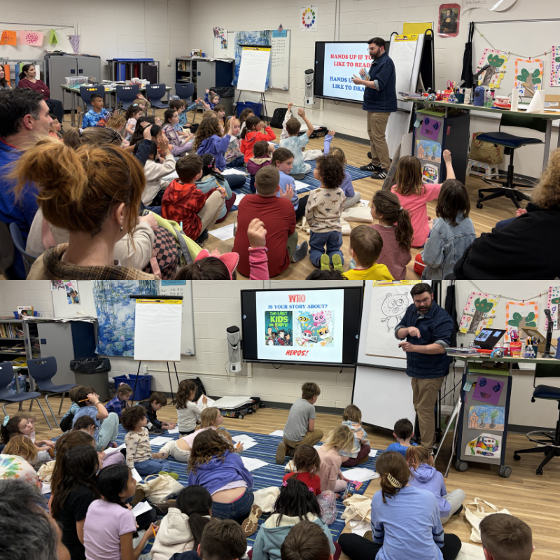 A teacher leads a classroom of children in an interactive session, with hands raised in participation.