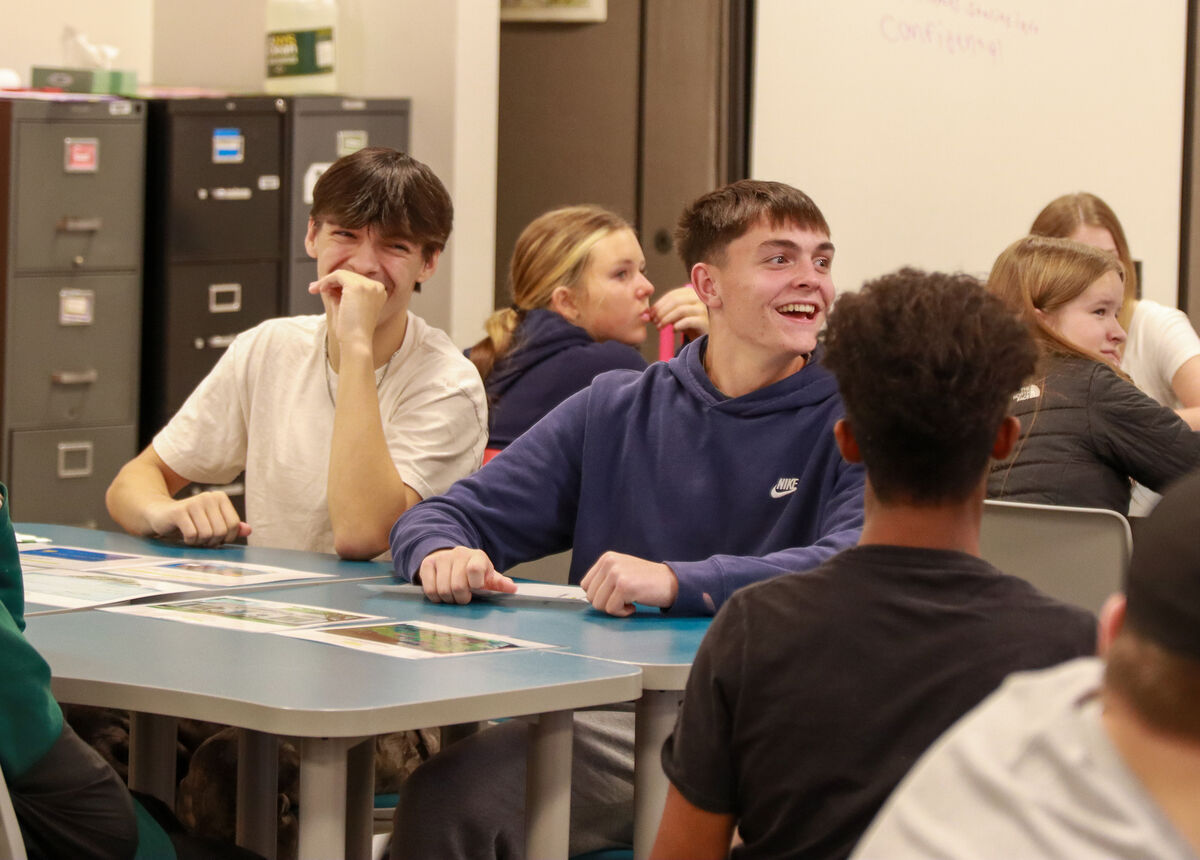 JCB students share a laugh during a budgeting exercise in Hailey Misurda's class.