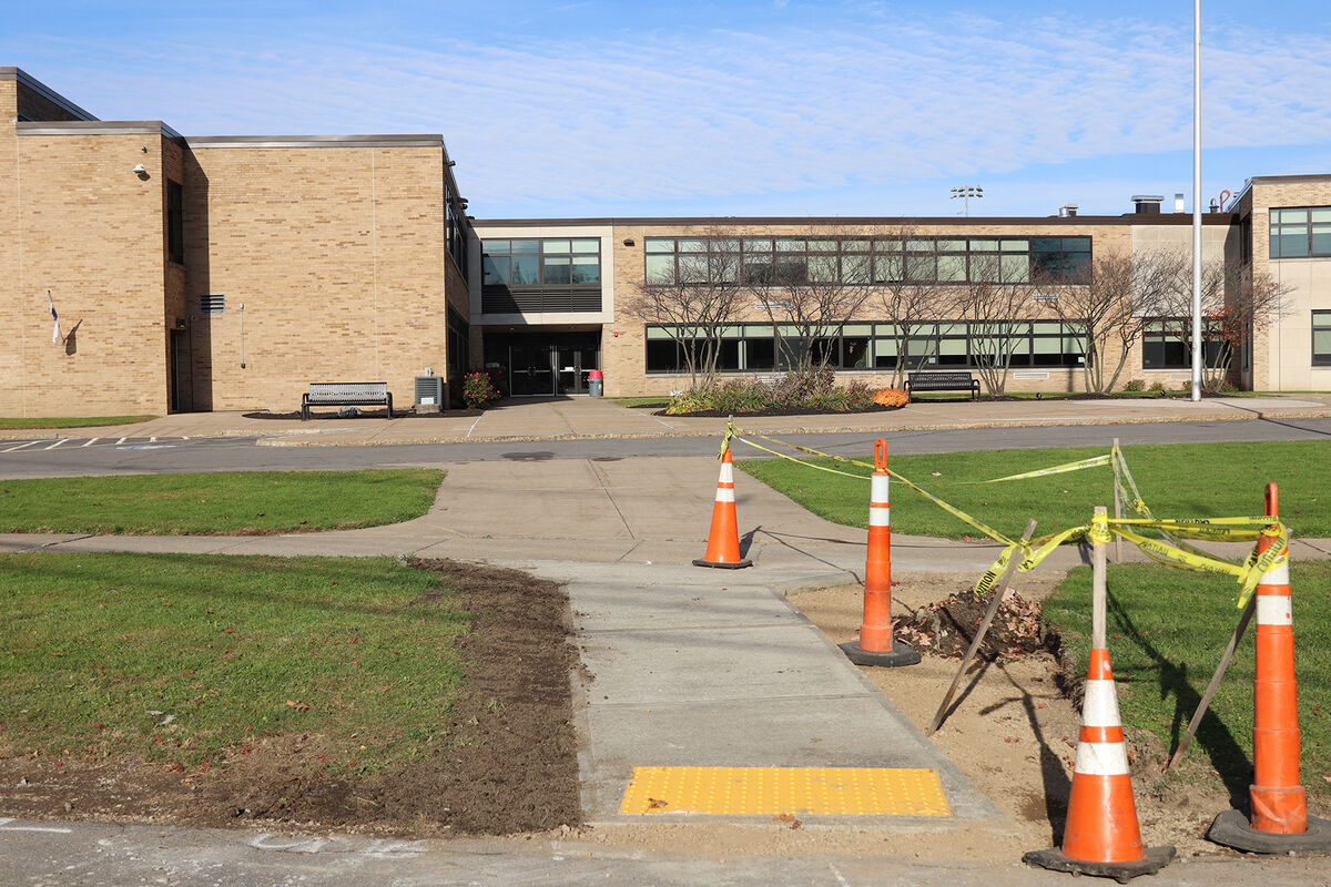 Concrete is poured to create a new crosswalk at JCB High School.