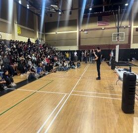 Image of RCMS' student assembly with Dr Blake