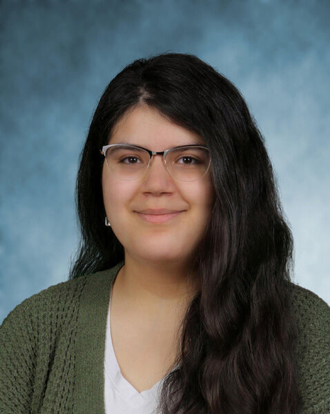 close up of young woman, long hair, glasses
