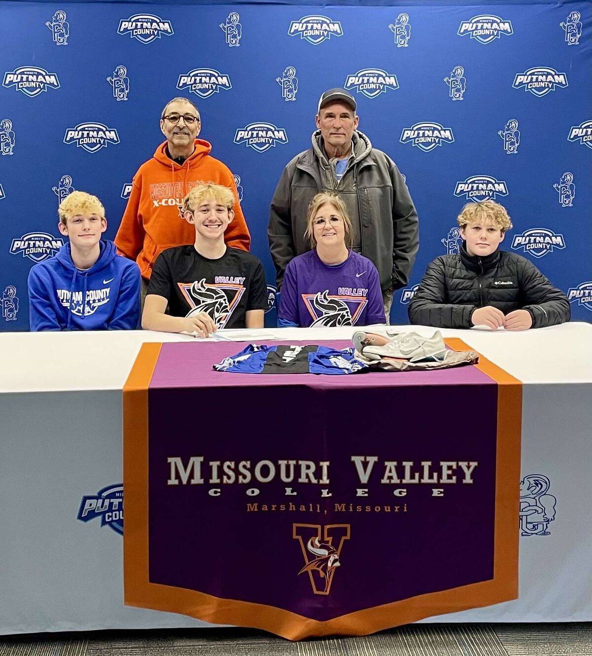 Corbin, Avery, Kathy, and Owen (front row) Back row, MO Valley Track & Field Steve Lucito, Donnie Campbell.