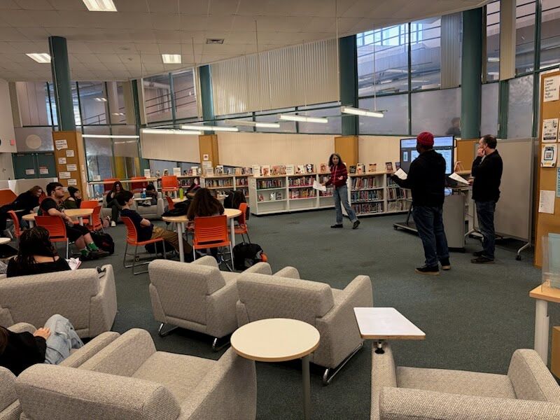 Students listening to visiting poets.