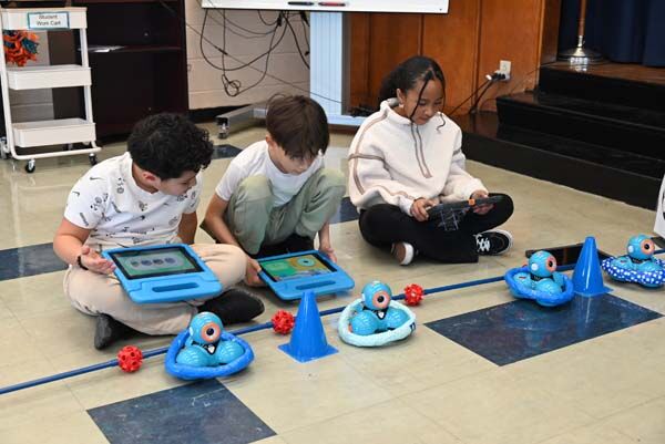 Students taking coding lessons.