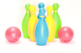 A group of colorful bowling pinsAI-generated content may be incorrect.