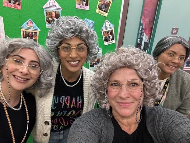 Image of four teachers dressed in costumes inspired by senior citizens